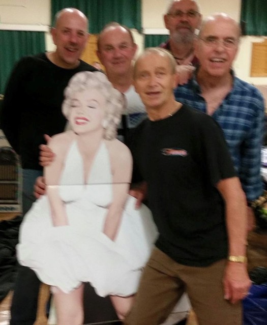 With Mick and Kenny, promoters and some famous woman...