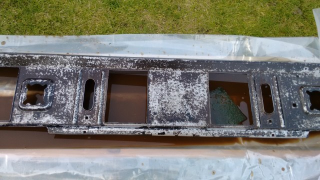 This is how it looked after a light rub with Scotchbrite