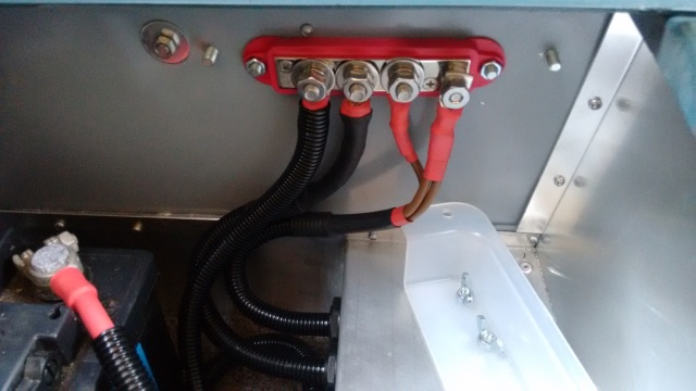 Busbar and battery in seat box
